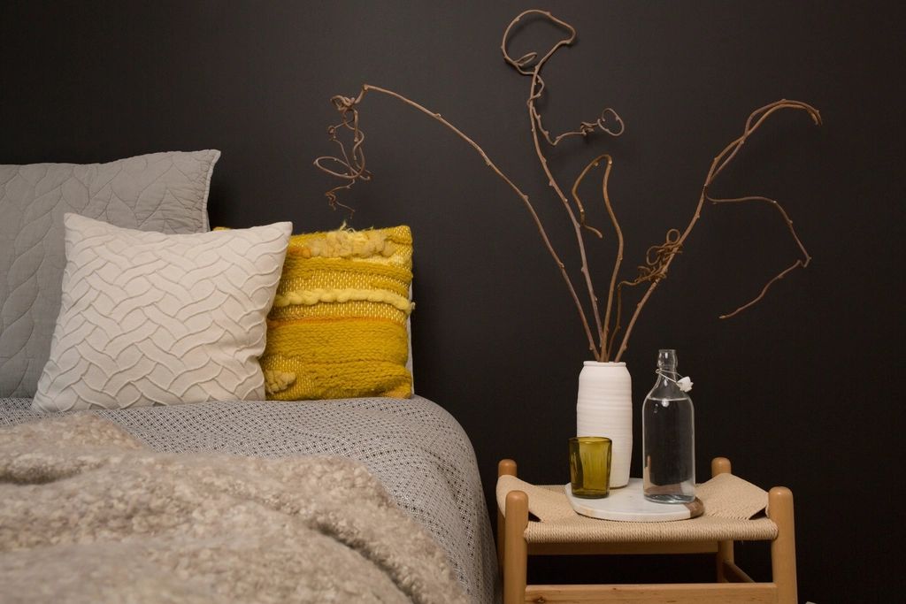 A guest room with two beds and a window